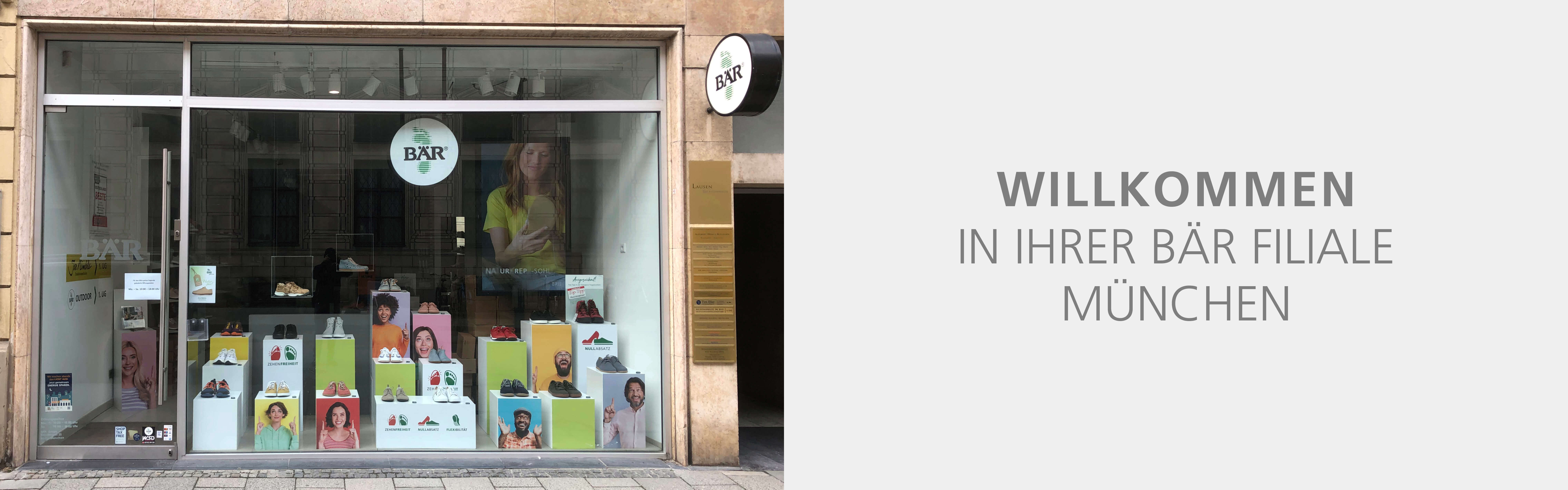 Schaufenster der BÄR Filiale in München mit diversen Schuhmodellen und Werbeplakaten