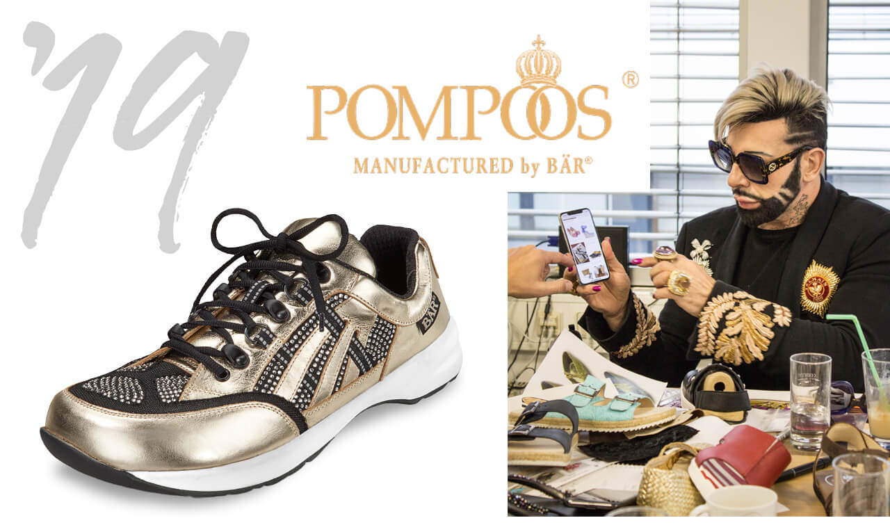 Goldener Sneaker von Pompoos by Bär, daneben eine Person mit Smartphone und luxuriösem Outfit